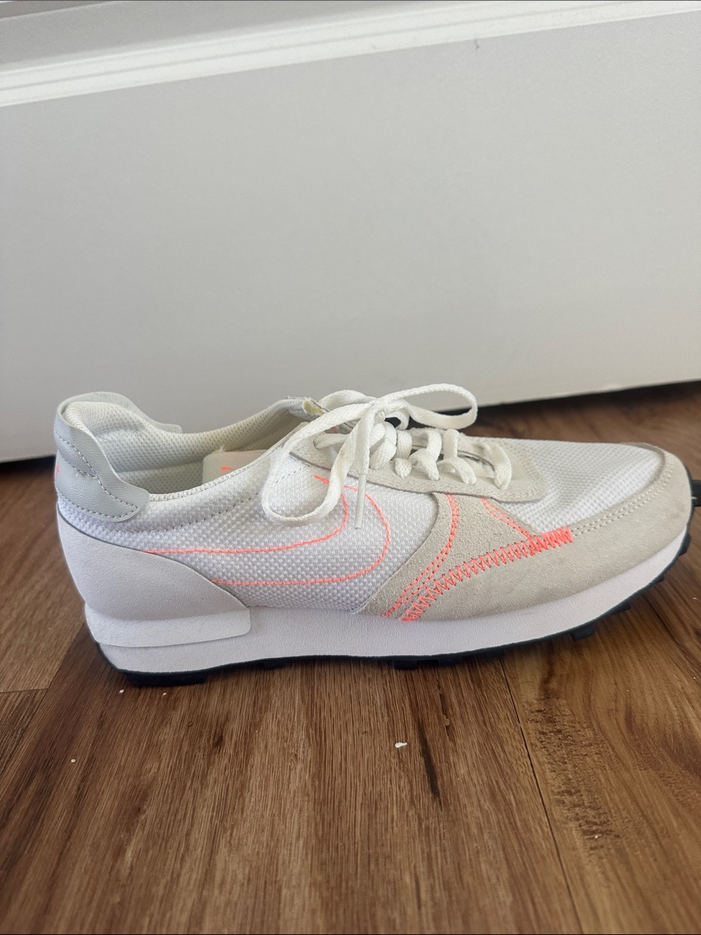 Nike Women's White Trainer with Coral Stitching